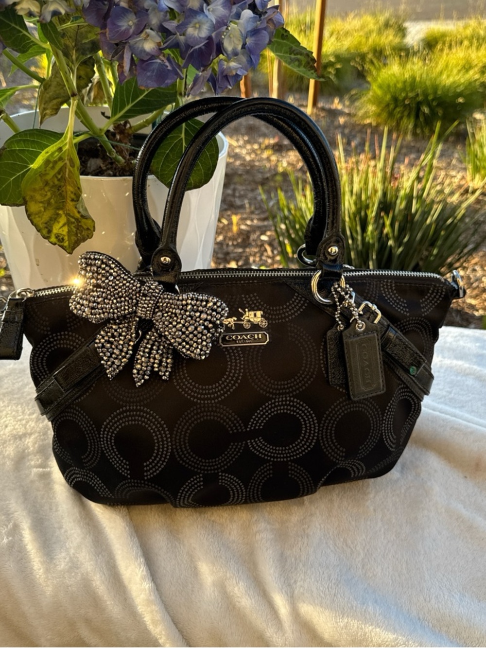 Coach Black Signature Canvas Satchel with Rhinestone Bow Charm Accent
